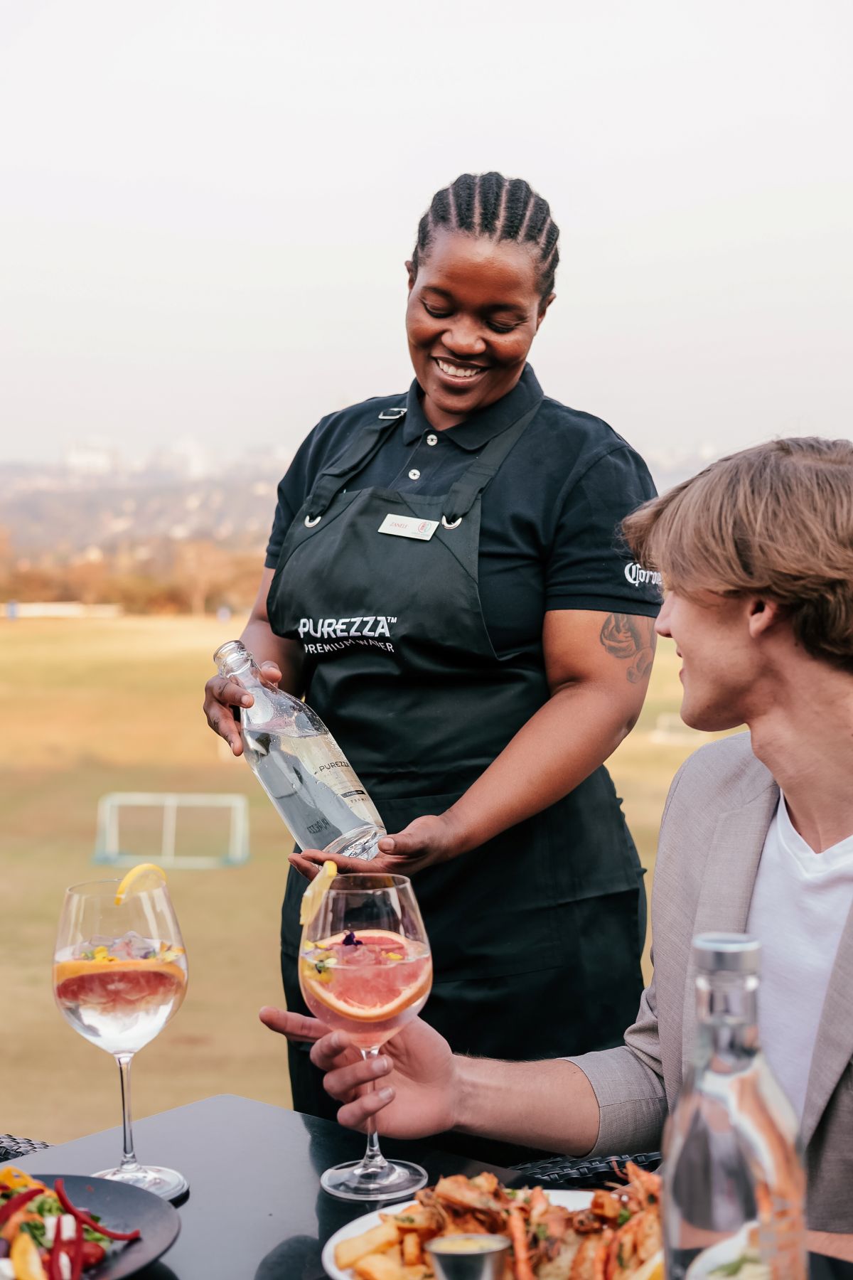 Serving Purezza Premium Water